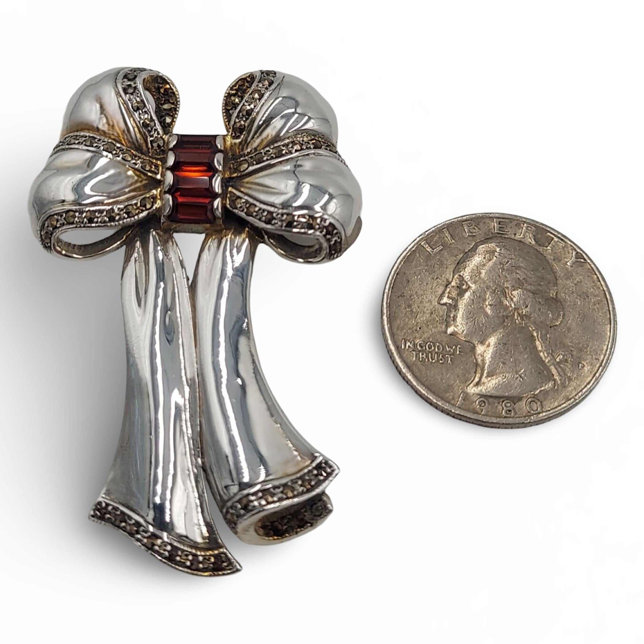 Detail view of Fine Bead Set Marcasite Bow Pin or Brooch with Garnets highlighting Garnet, Marcasite