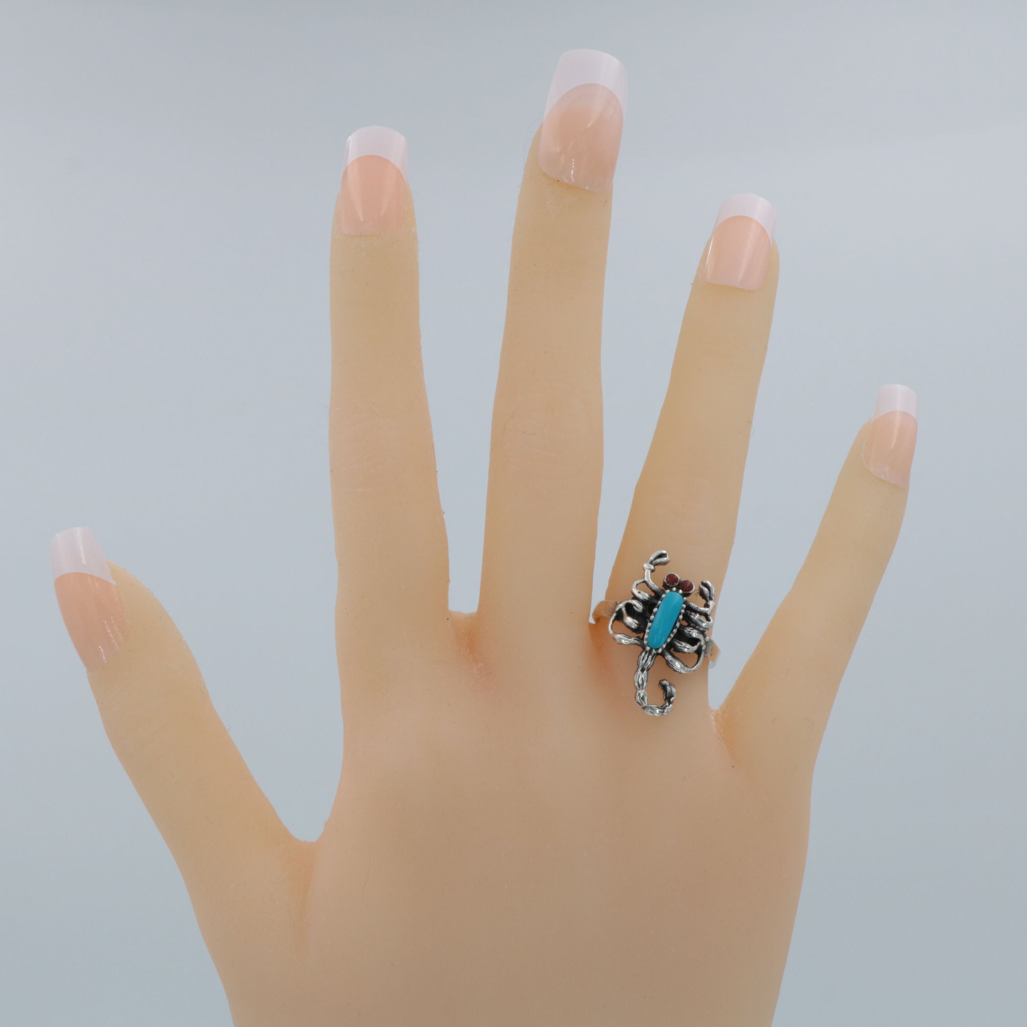 Detail view of Turquoise Body Scorpion Ring with Carnelian Eyes Scorpio Sterling Silver highlighting Carnelian, Turquoise