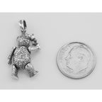 Back view of Teddy Bear Rose in Hand Pendant Charm - Movable Sterling Silver showing 925 sterling silver hallmark and spring 