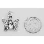 Back view of Movable Butterfly Charm Pendant - Moveable showing 925 sterling silver hallmark and spring ring clasp