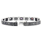 Back view of Victorian Style Blue Topaz Amethyst and Garnet Filigree Bracelet Silver showing 925 sterling silver hallmark and