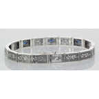 Detail view of Victorian Style Floral Blue Sapphire Filigree Link Bracelet Sterling Silver highlighting Sapphire