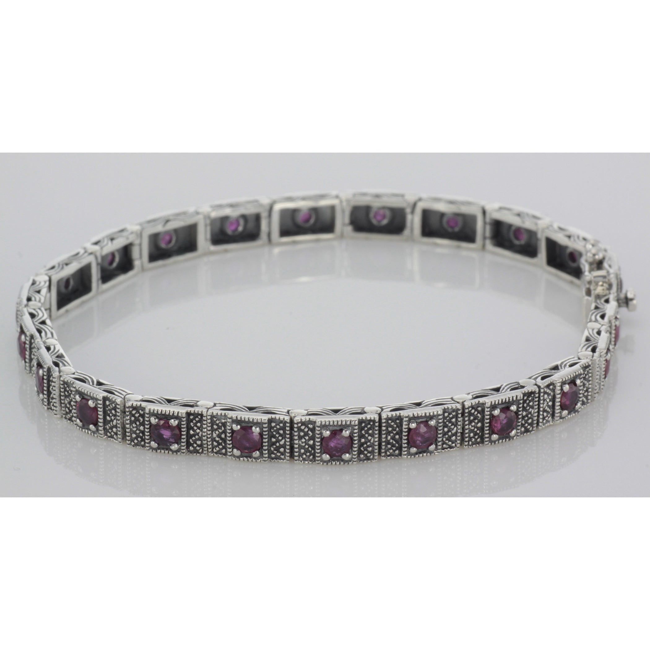 Detail view of Beautiful Victorian Style Ruby Filigree Link Bracelet in fine Sterling Silver highlighting Ruby