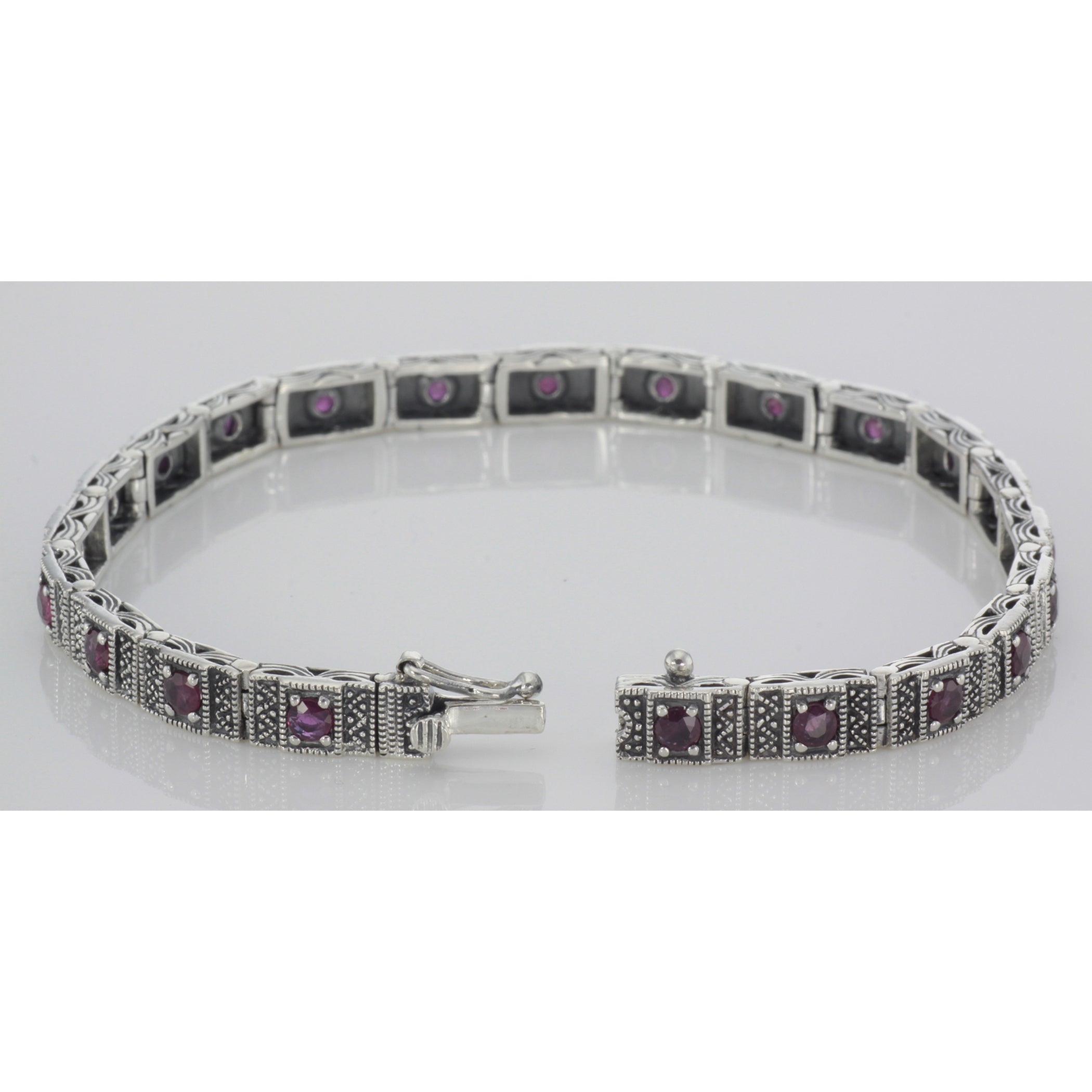 Back view of Beautiful Victorian Style Ruby Filigree Link Bracelet in fine Sterling Silver showing 925 sterling silver hallma