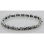 Detail view of Victorian Style Sapphire Filigree Link Bracelet in fine Sterling Silver highlighting Sapphire