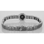 Detail view of Art Deco Style Black Onyx and White Topaz Filigree Link Bracelet Sterling Silver highlighting White Topaz, Bla