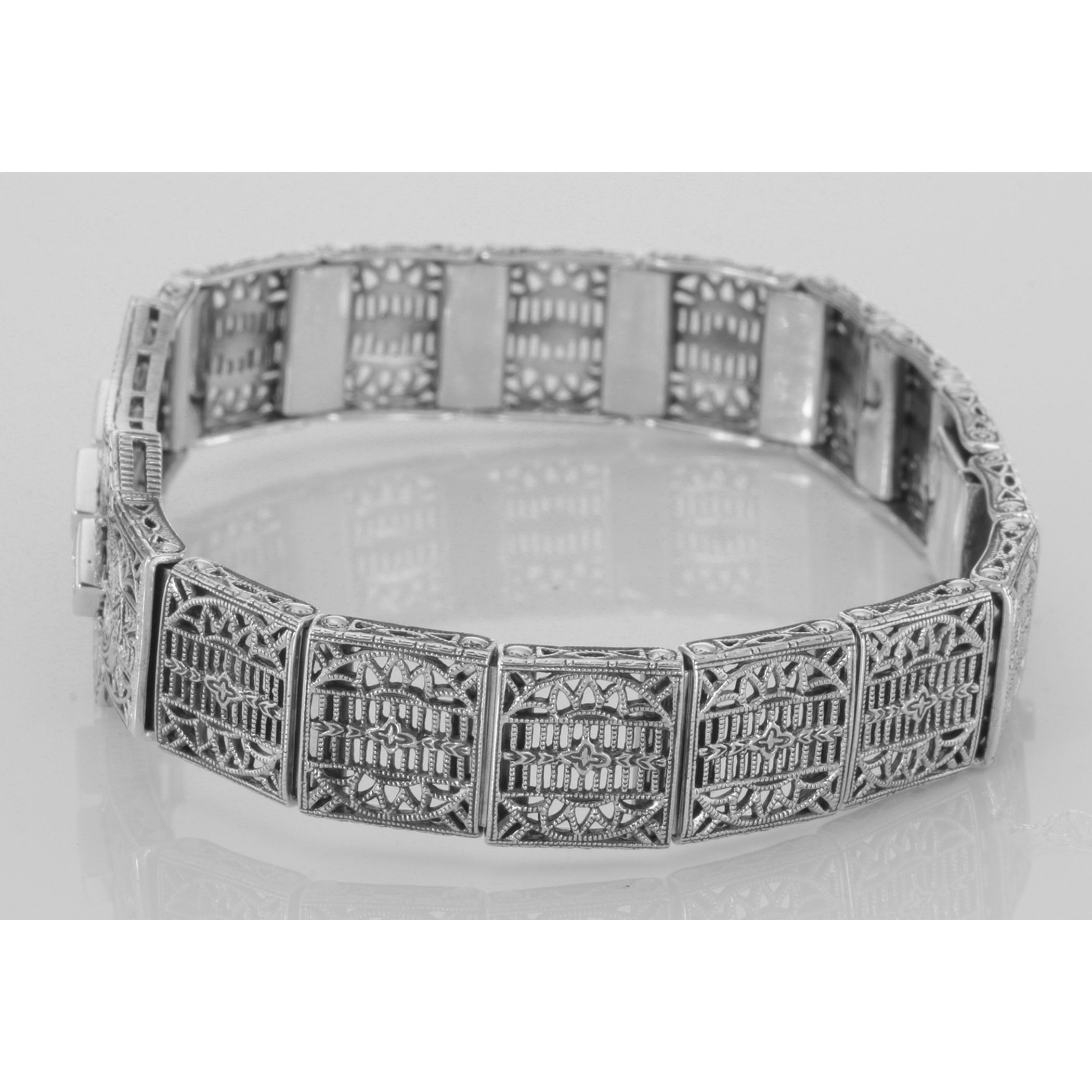 Detail view of Art Deco Style Filigree Bracelet with 3 Natural Green Emeralds highlighting Emerald