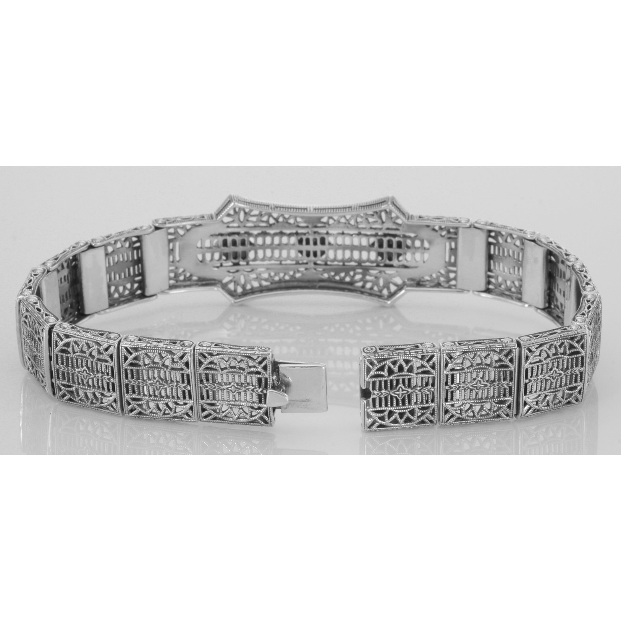Back view of Art Deco Style Filigree Bracelet with 3 Natural Green Emeralds showing 925 sterling silver hallmark and toggle o