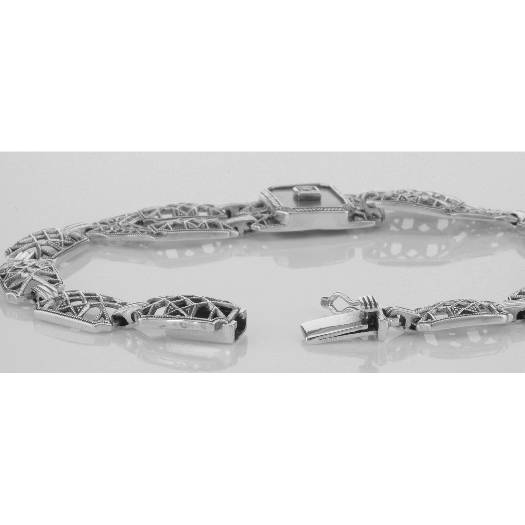 Back view of Victorian Style Mother of Pearl Filigree Link Bracelet Sterling Silver showing 925 sterling silver hallmark and 