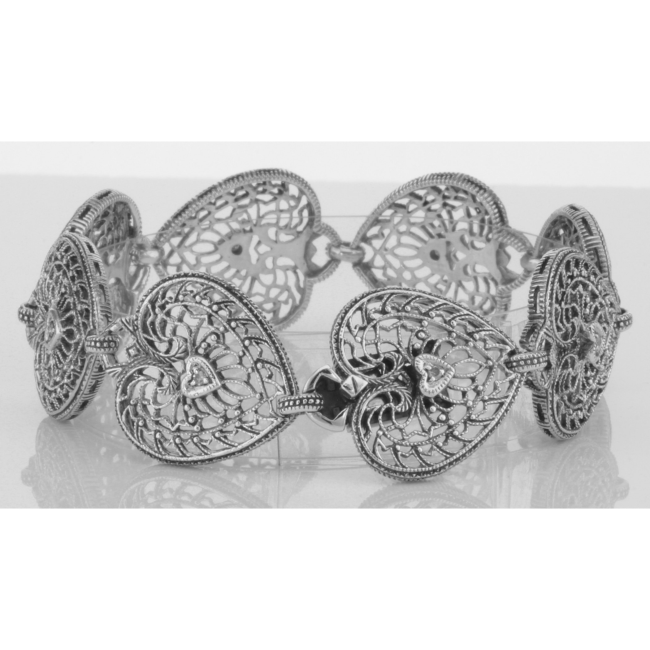 Back view of ONLY 1 IN STOCK - Victorian Style Filigree Diamond Heart Bracelet in fine Sterling Silver showing 925 sterling s