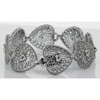 Back view of ONLY 1 IN STOCK - Victorian Style Filigree Heart Bracelet w/ Blue Sapphire in fine Sterling Silver showing 925 s
