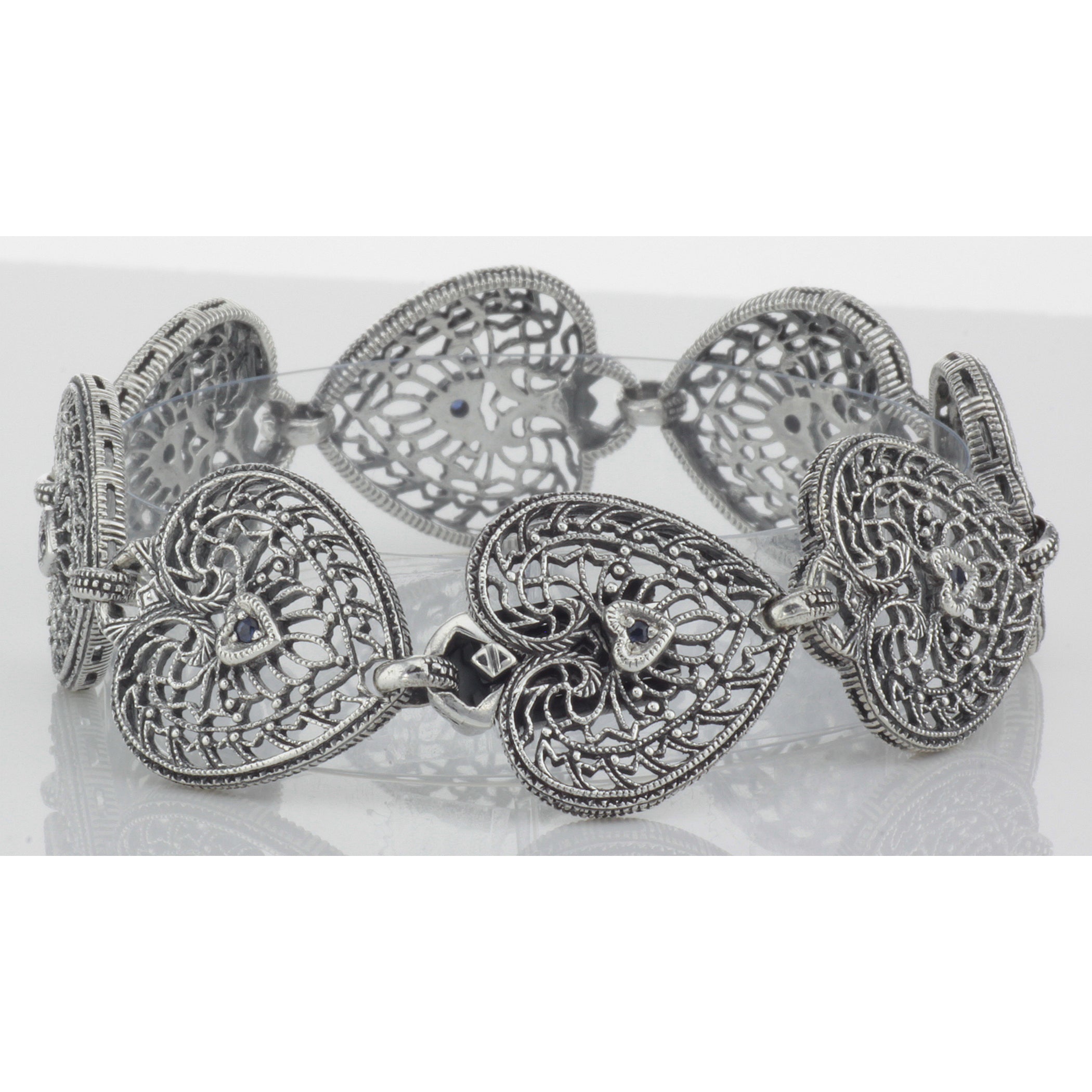 Back view of ONLY 1 IN STOCK - Victorian Style Filigree Heart Bracelet w/ Blue Sapphire in fine Sterling Silver showing 925 s