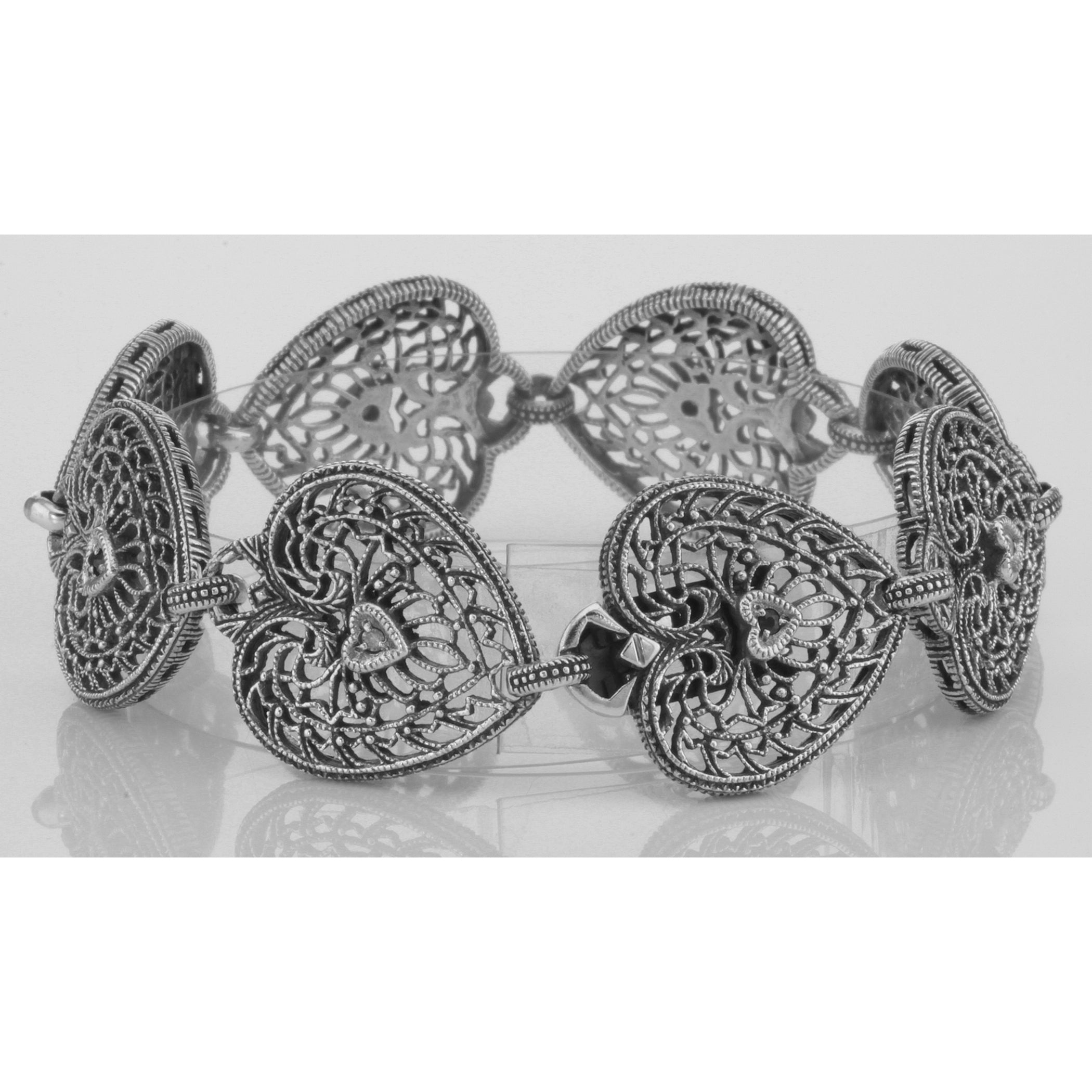 Back view of Victorian Style Filigree Heart Bracelet Diamond and Sapphire Sterling Silver showing 925 sterling silver hallmar