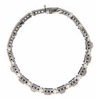 Back view of Art Deco Style Blue Sapphire White Topaz Filigree Bracelet Sterling Silver showing 925 sterling silver hallmark 