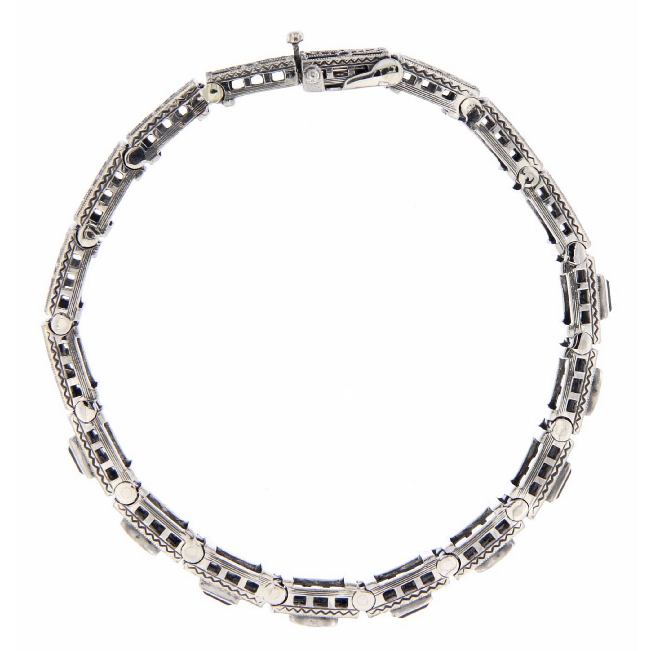Back view of Art Deco Style Blue Sapphire White Topaz Filigree Bracelet Sterling Silver showing 925 sterling silver hallmark 