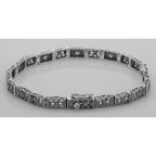 Detail view of Victorian Style 3 Stone White Topaz Filigree Bracelet in Fine Sterling Silver highlighting White Topaz