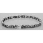 Back view of Victorian Style 3 Stone White Topaz Filigree Bracelet in Fine Sterling Silver showing 925 sterling silver hallma