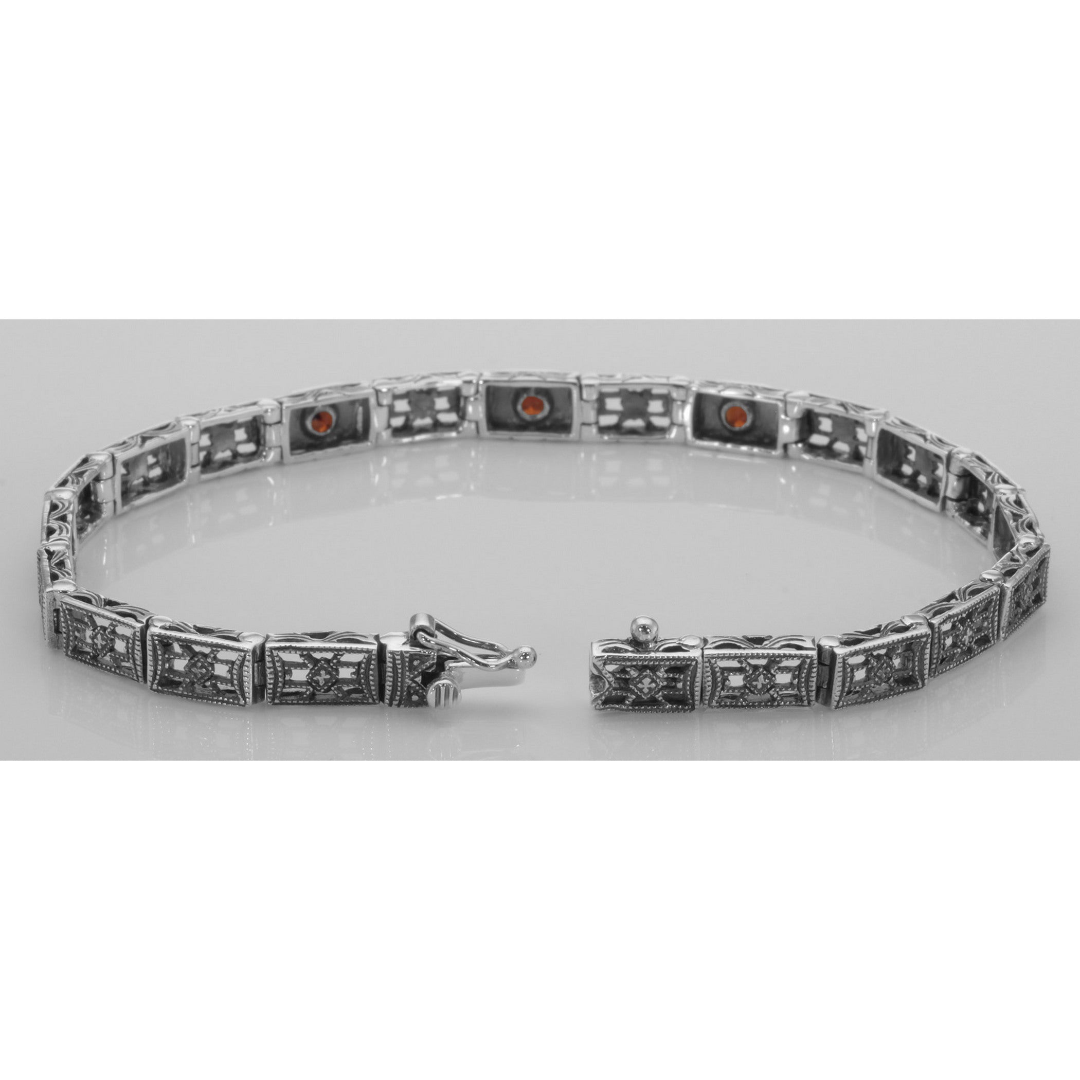 Back view of Victorian Style 3 Stone Red Garnet Filigree Bracelet in Fine Sterling Silver showing 925 sterling silver hallmar
