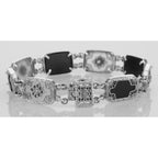 Detail view of Victorian Style Camphor Glass Onyx Diamond Filigree Bracelet Sterling Silver highlighting Diamond, Onyx