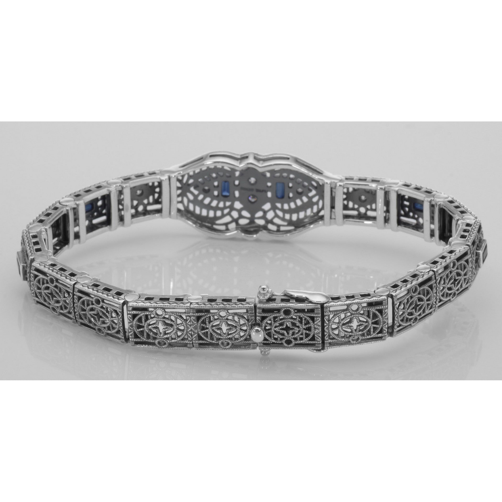 Detail view of Art Deco Style Blue Sapphire White Topaz Filigree Bracelet Sterling Silver highlighting White Topaz, Sapphire