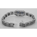 Back view of Art Deco Style Blue Sapphire White Topaz Filigree Bracelet Sterling Silver showing 925 sterling silver hallmark 