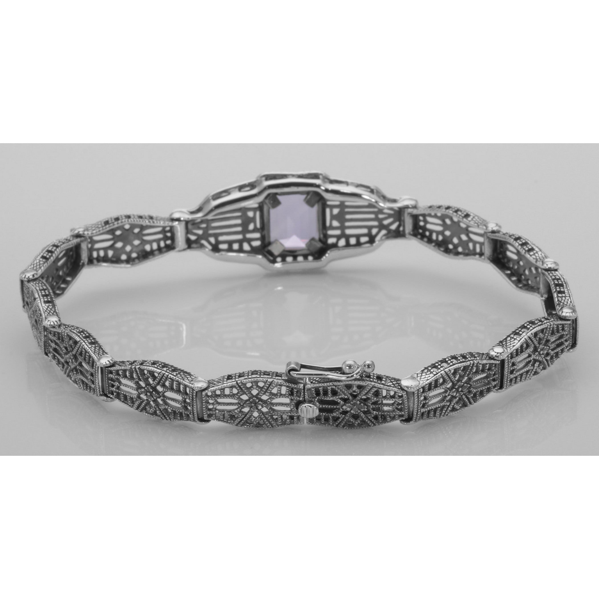 Detail view of Victorian Style Amethyst Filigree Link Bracelet in Fine Sterling Silver highlighting Amethyst