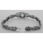 Back view of Victorian Style Blue Topaz Filigree Link Bracelet in Fine Sterling Silver showing 925 sterling silver hallmark a