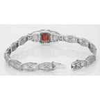 Back view of Victorian Style Garnet Filigree Link Bracelet in Fine Sterling Silver showing 925 sterling silver hallmark and t