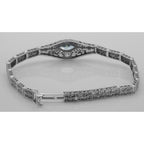 Back view of Victorian Style Blue Topaz Filigree Link Bracelet in Fine Sterling Silver showing 925 sterling silver hallmark a