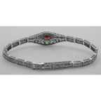 Detail view of Victorian Style Garnet Filigree Link Bracelet in Fine Sterling Silver highlighting Garnet