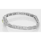 Detail view of Victorian Style Peridot Filigree Link Bracelet in Fine Sterling Silver highlighting Peridot