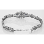 Back view of Art Deco Style Blue Sapphire Diamond Filigree Bracelet in Fine Sterling Silver showing 925 sterling silver hallm