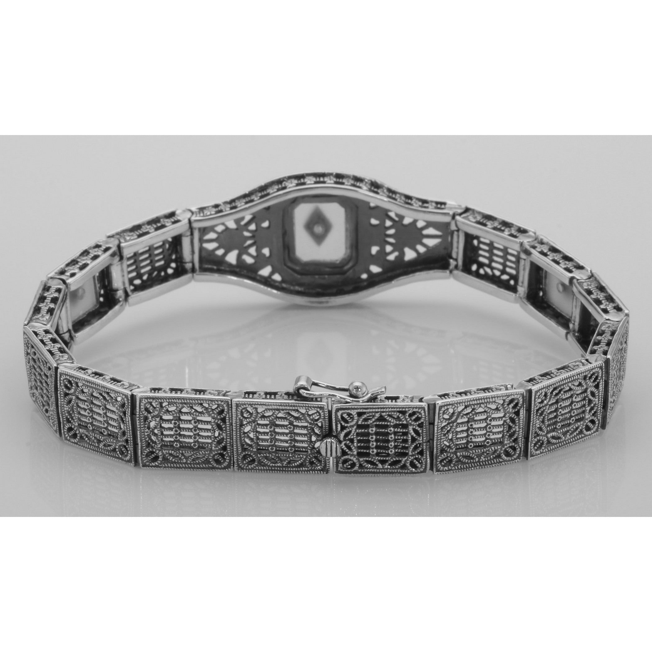 Detail view of Art Deco Style 3 Stone Camphor Glass and Diamond Filigree Link Bracelet Sterling highlighting Diamond, Camphor
