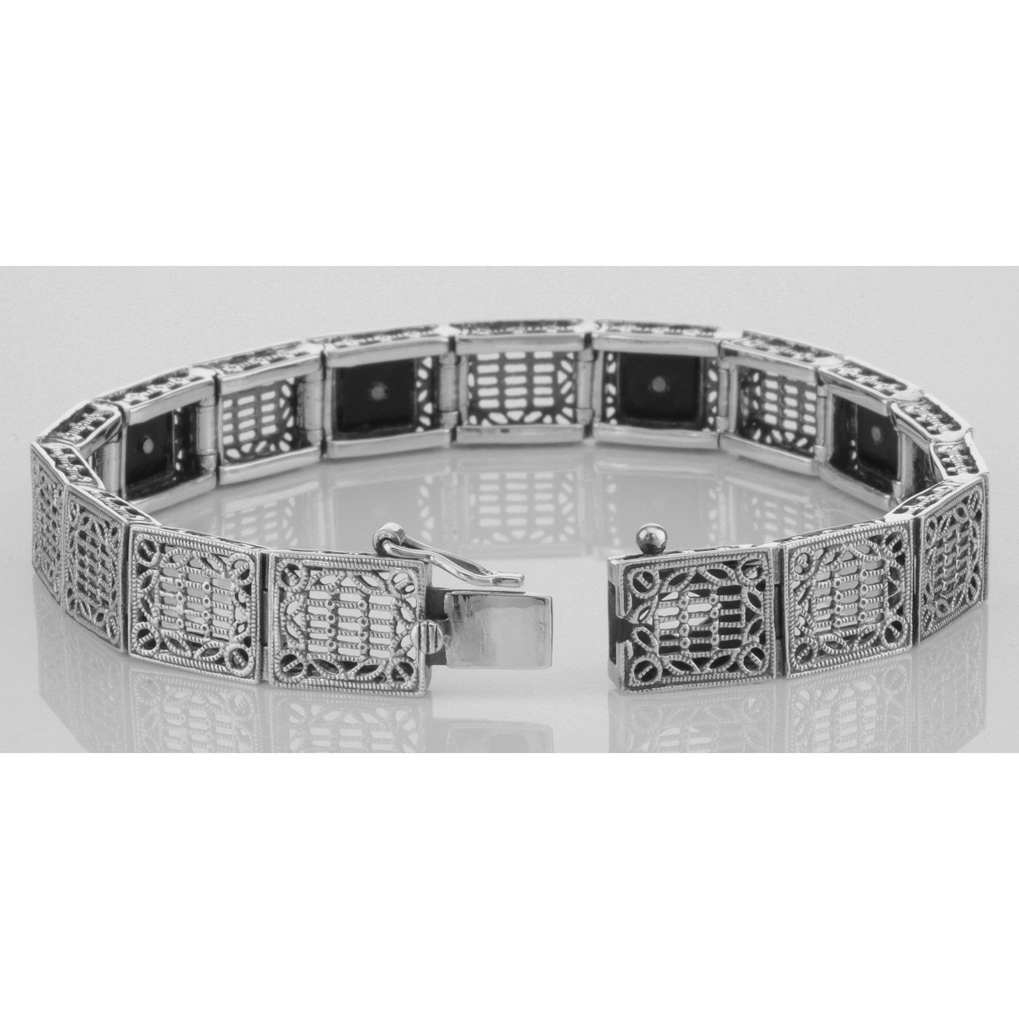 Back view of Art Deco Style Filigree Link Bracelet Black Onyx and Diamonds showing 925 sterling silver hallmark and toggle or