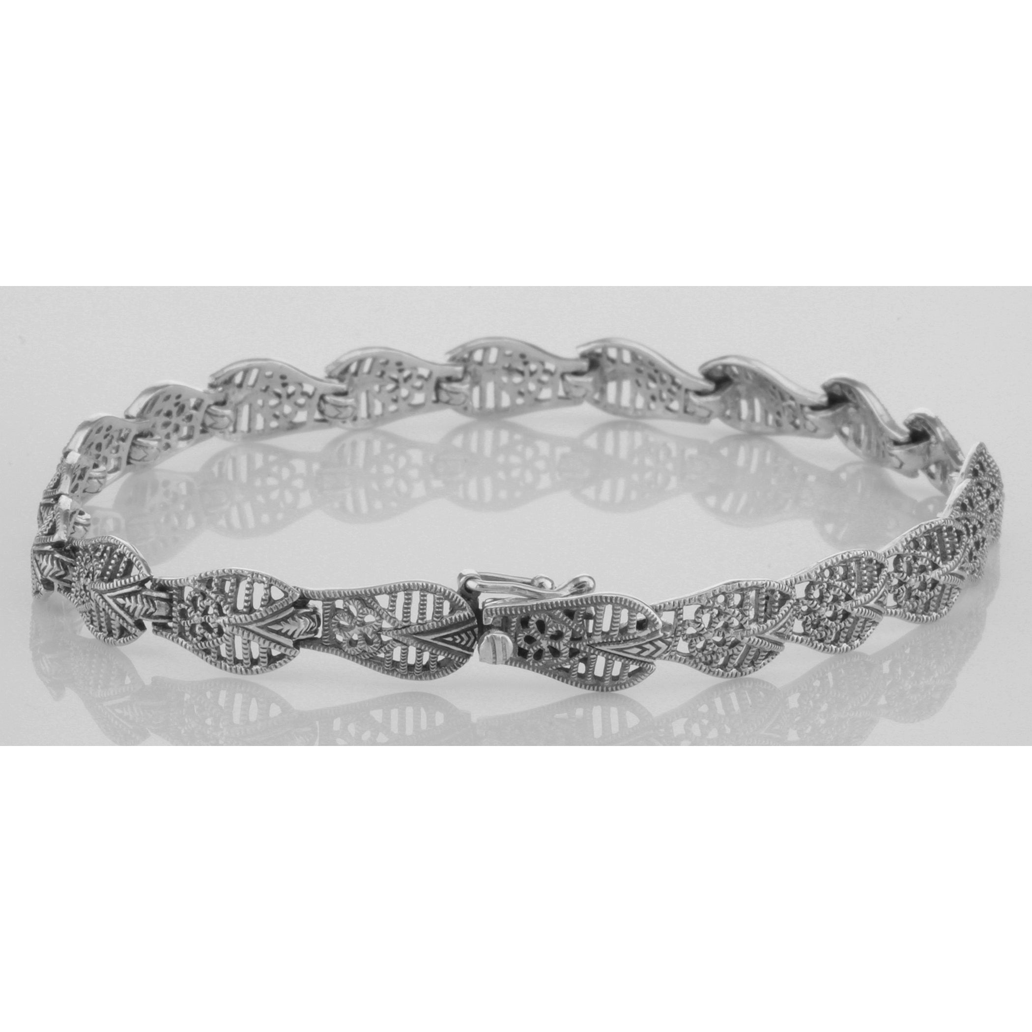 Detail view of Victorian Style Filigree Link Bracelet in fine Sterling Silver highlighting design details