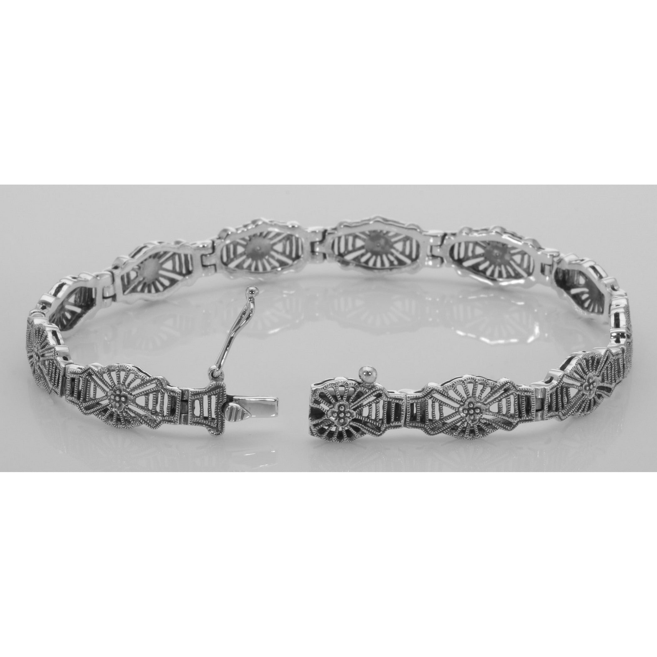 Back view of Beautiful Victorian Style 3 Diamond Filigree Link Bracelet showing 925 sterling silver hallmark and toggle or lo