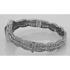 Detail view of Victorian Style Filigree Black Onyx / Diamond Bangle Bracelet highlighting Diamond, Black Onyx