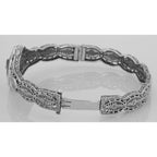 Detail view of Victorian Style Filigree Black Onyx / Diamond Bangle Bracelet highlighting Diamond, Black Onyx