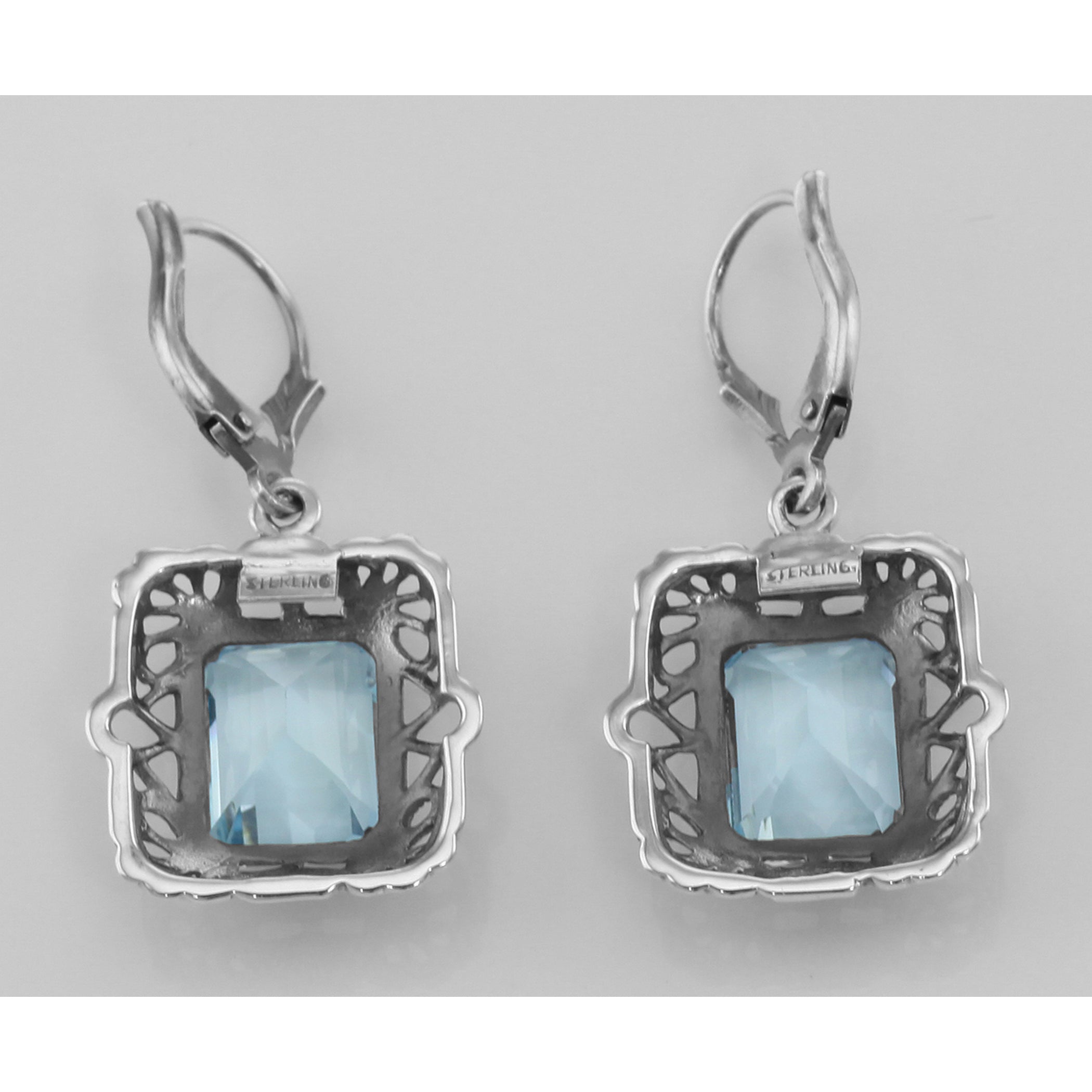 Back view of Art Deco Style Filigree 8 Carat TW Blue Topaz Earrings showing 925 sterling silver hallmark and French wire hooks