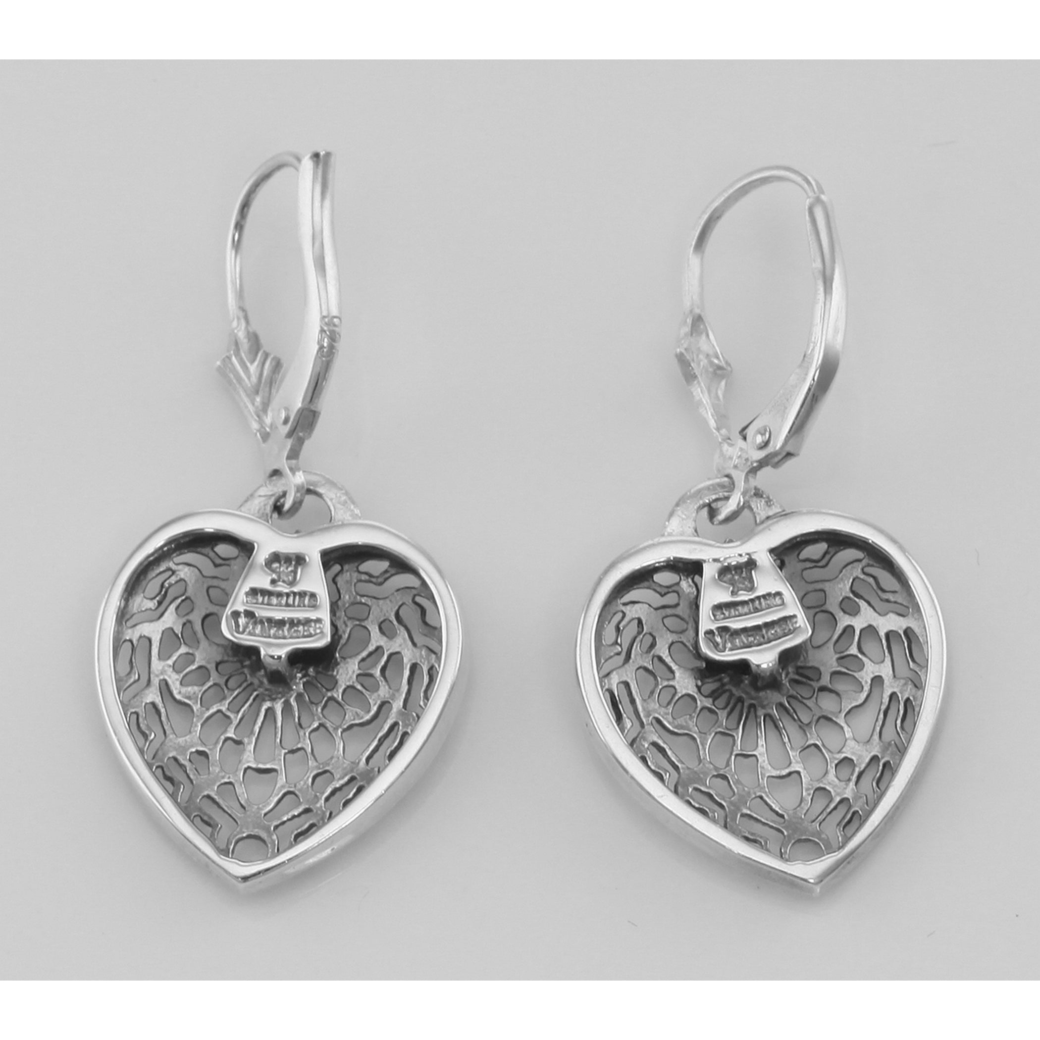 Back view of Antique Style Heart Shaped Filigree Earrings w/ Diamond showing 925 sterling silver hallmark and French wire hooks
