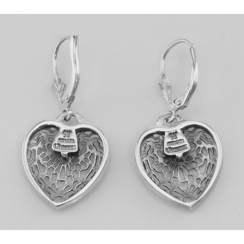 Back view of Antique Style Heart Shaped Filigree Earrings w/ Diamond showing 925 sterling silver hallmark and French wire hooks