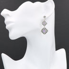 Detail view of Art Deco Style Amethyst Two Tiered Earrings highlighting amethyst detail