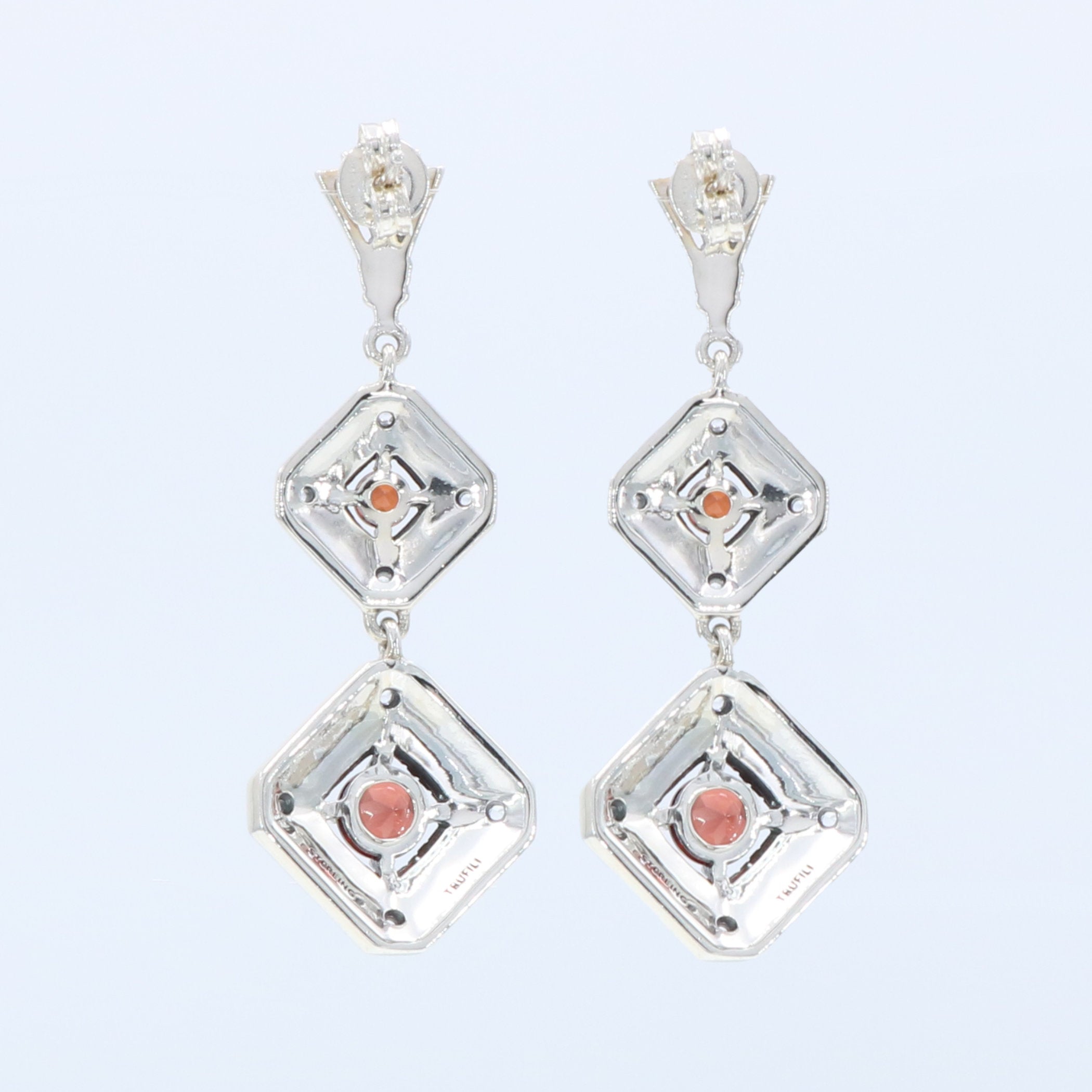 Back view of Art Deco Style Garnet Two Tiered Earrings showing 925 sterling silver hallmark and French wire hooks