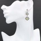 Detail view of Art Deco Style Peridot Two Tiered Earrings highlighting craftsmanship detail