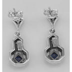 Back view of Sapphire and White Topaz Filigree Earrings showing 925 sterling silver hallmark and French wire hooks