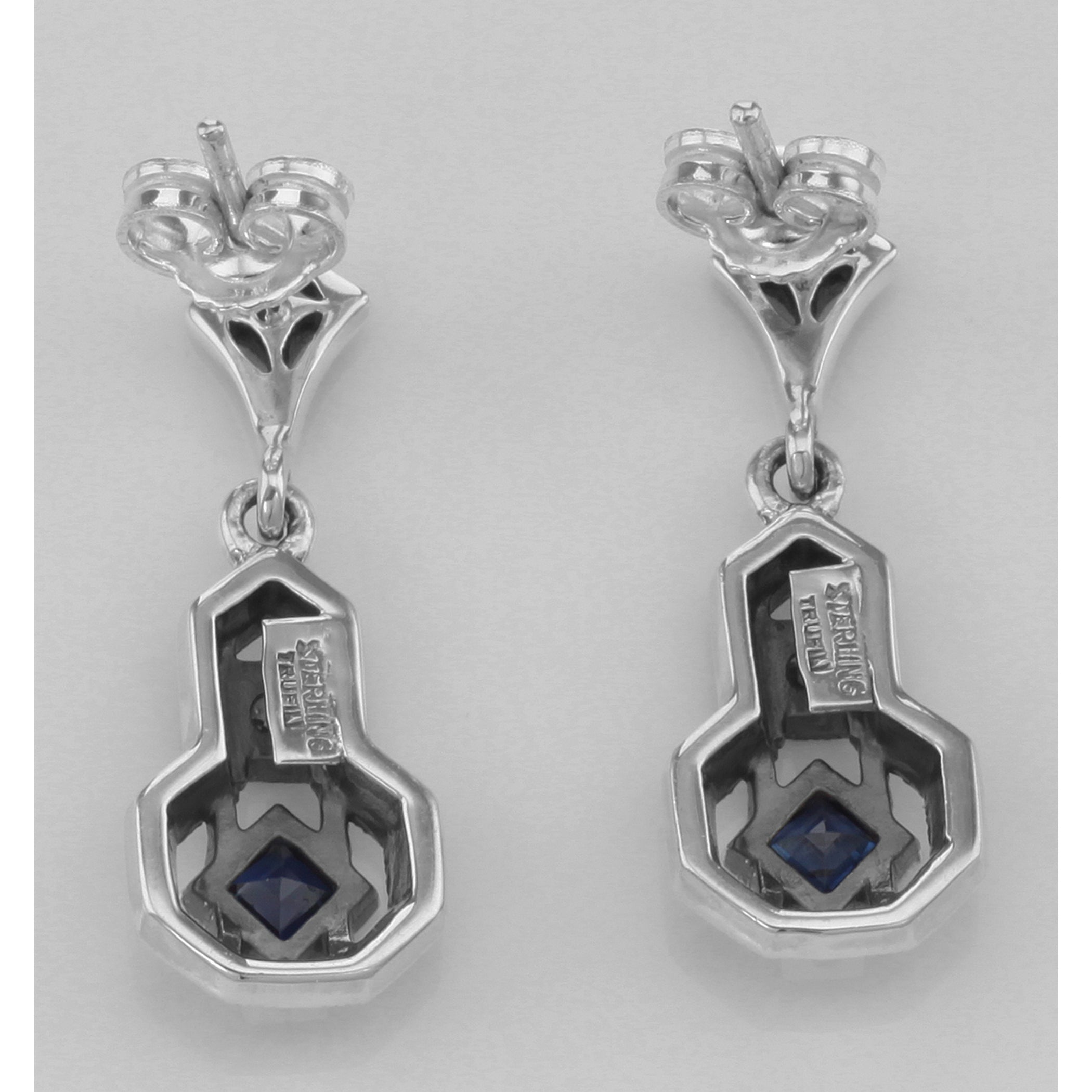 Back view of Sapphire and White Topaz Filigree Earrings showing 925 sterling silver hallmark and French wire hooks