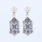 Back view of Art Deco Genuine Ruby and White Topaz Filigree Earrings showing 925 sterling silver hallmark and French wire hooks