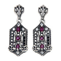 Art Deco elongated earrings, ruby and white topaz in hexagonal filigree frame, crown post stud, sterling silver