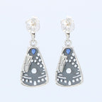 Back view of Art Deco Blue Sapphire and White Topaz Filigree Earrings showing 925 sterling silver hallmark and French wire hooks