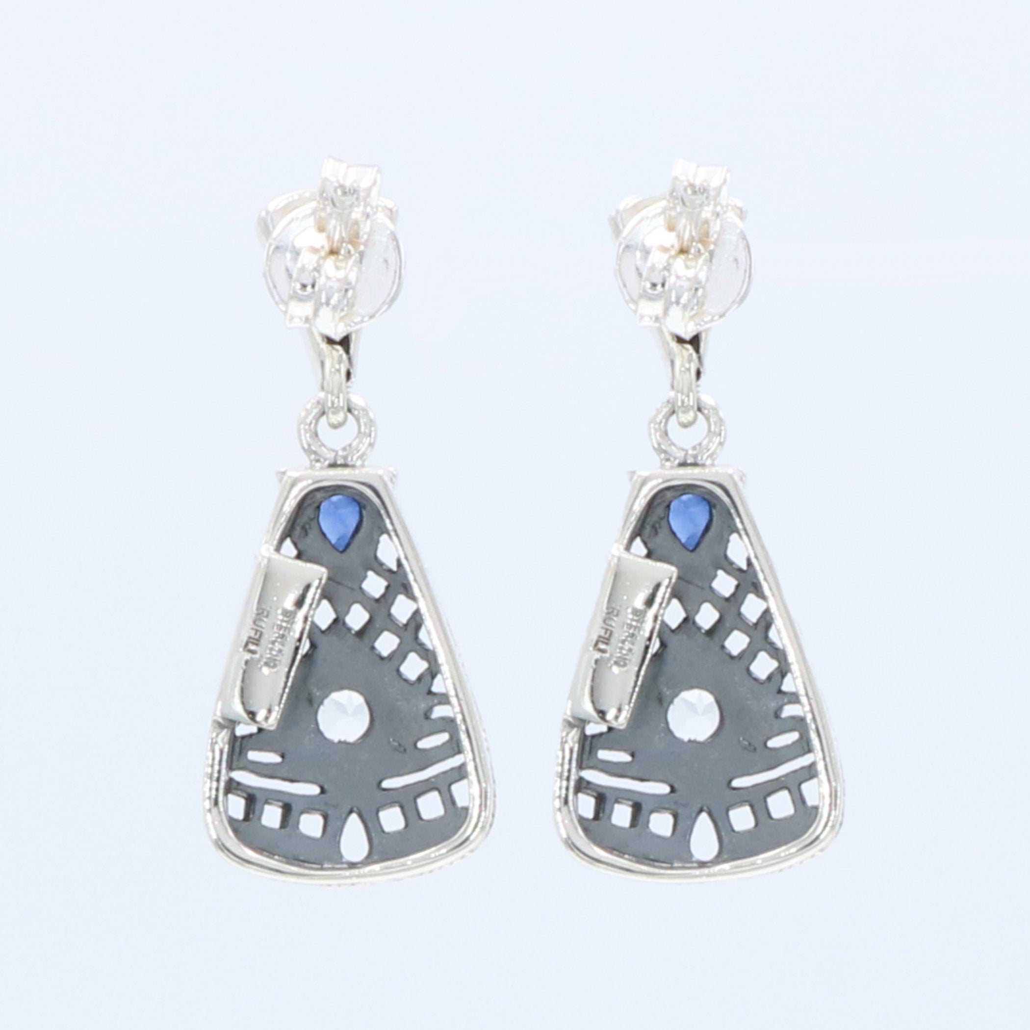 Back view of Art Deco Blue Sapphire and White Topaz Filigree Earrings showing 925 sterling silver hallmark and French wire hooks